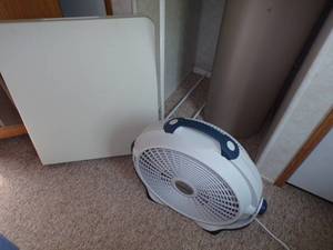 Folding table, fan, clothes rack