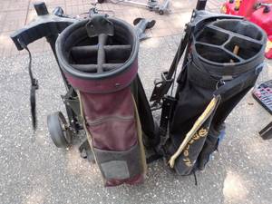 2 golf bags with carts