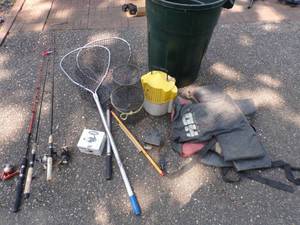 Fishing lot with Rods and Reels, Nets, Minnow bucket, garbage can, and life Jackets