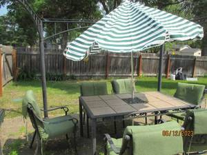 lot 36 image: Ornate Metal framed patio table wit...