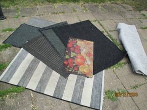 lot 38 image: Assortment of outdoor rugs and floo...