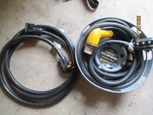 lot 51 image: Set of (2) 50 amp RV electric power cords