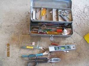 lot 66 image: Metal tool box full of assorted han...