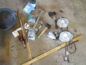 lot 93 image: Clip on Treble lights, Rubber Mallet, Axes, Sledge hammer, Mosquito repellent Lantern, Ice Fishing Poles and more
