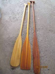 lot 105 image: Tri-fecta of wood canoe oarspaddle...