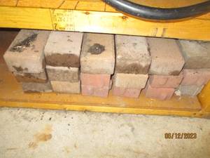 lot 106 image: Short stack of landscaping bricks...
