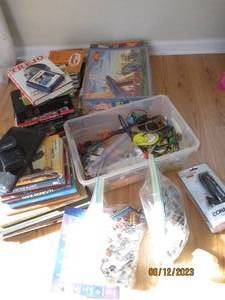 lot 200 image: Puzzles and reading materials to oc...