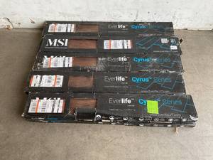 lot 24 image: LOT OF 10 Cases of MSI Woodland Antique Mahogany 12 MIL x 7.1 in. W x 48 in. L Click Lock Waterproof Lux Vinyl Plank Flooring