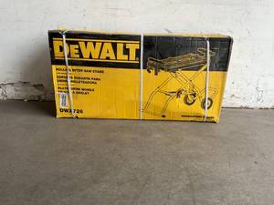 lot 83 image: Dewalt 32-12 in. x 60 in. Rolling Miter Saw Stand with 300 lbs. Capacity