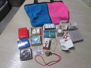 Assorted Avon Jewelry with Avon Bag...