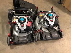 lot 17 image: 2 Lots of Murray 21 in. 140 cc Briggs and Stratton Walk Behind Gas Push Lawn Mower with Height Adjustment and with Mulch Bag 1 Bag Included Only Customer Returns See Pictures