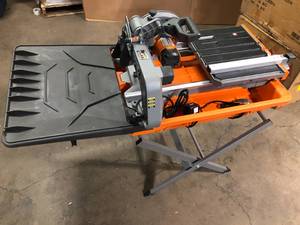 lot 22 image: RIDGID 12 Amp Corded 8 in. Tile Saw with Extended Rip Customer Returns See Pictures