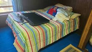 lot 205 image: Queen size bed with linens...