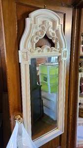 lot 164 image: White hanging mirror with lots of d...