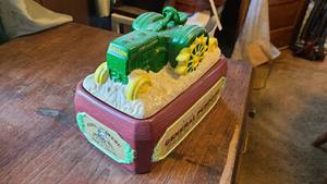 lot 151 image: John Deere collectable cookie jar, ...