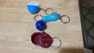 lot 133 image: 4 Small key chains, 2 of which are ...