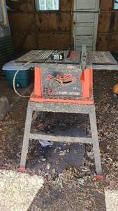 lot 125 image: Black and Decker 13 amp table saw a...