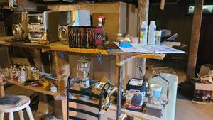 lot 117 image: Basement shelving lot with propane ...