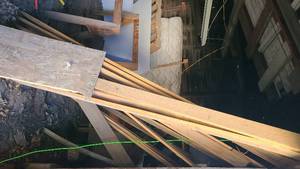 lot 115 image: Wood ready for use stored in outbui...