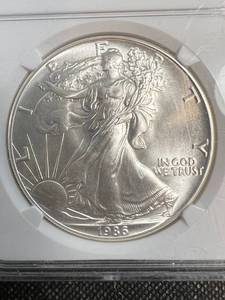 1986 AMERICAN SILVER EAGLE MS69 NGC