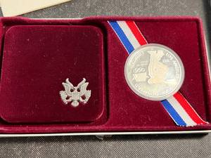 1983 US OLYMPIC SILVER DOLLAR IN ORIGINAL PACKAGING