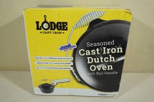 lot 56 image: Lodge Seasoned Cast Iron Dutch Oven with Bail Handle 5 Quart