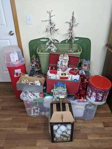lot 22 image: Large Christmas Lot Waterford Crystal Ornaments, Lemax Ceramic Houses, Lighted Decor, Wrapping Paper, and Storage Bins