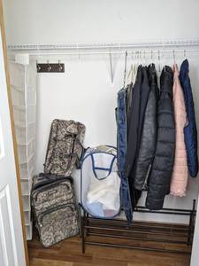 lot 73 image: Assortment of Shoe Racks, Suitcases, Clothing, Jackets, & More