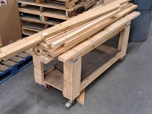 lot 57 image: Wood Rolling Custom Cart 50x22x25 with Scrap Wood