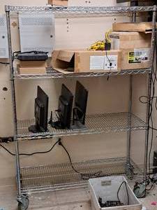 lot 338 image: Metal Wire Rolling Shelving Unit
