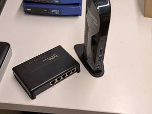 lot 679 image: Lot of (2) Electronics - Plugable USB 3.0 Docking Station, StarTech 5-port 1100 Ethernet Desktop Switch DS51072