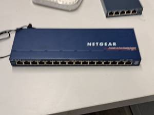 lot 688 image: Lot of (3) Routers - Netgear ProSafe 16-port Gigabit Switch GS116, TP-Link 5-Port Gigabit Desktop Switch, Netgear 5-port Switch GS605