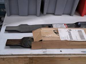 lot 410 image: Lot of (4) Oregon John Deere Mower Blades (There are 2 new and 2 used blades in this lot)