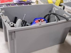 lot 422 image: Tote Bin with Funnel, Power Cord 6, Scotch Tape, Husky Plastic Tool Caddy, Misc