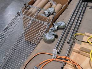 lot 736 image: Steel Wire Rolling Shelving Unit Parts - Shelves, Uprights, Caster Wheels
