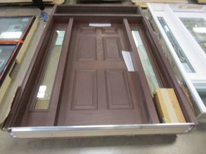 lot 7 image: Front Entryway Woodgrain 6 Panel Single Door with 2 Side Lites & Full Top Lite - 64.43 in x 98.18 in - Left Hand Inswing - Interior & Exterior Color is Moorish Teak - Jamb is Approximately 7.25 in (SMALL CHIP IN BRICKMOULD)