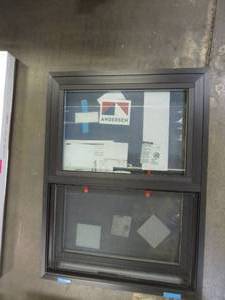lot 15 image: Andersen 100 Series 26 in x 35 in Single Hung Single Cam Window - Exterior is Bronze - Interior is White Vinyl