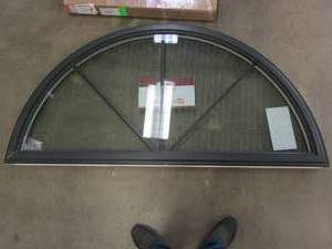 lot 34 image: Simonton 6500 Series 69.5 in x 34.75 in Geometric Window with Internal Grille - Exterior is Black Vinyl - Interior is White Vinyl (SLIGHT SCRATCH & DENT)