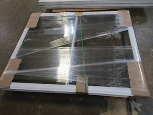 lot 46 image: Simonton 6100 Series 64.25 in x 52 in Slider Window in White Vinyl