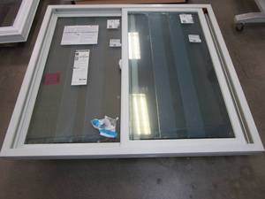 lot 52 image: Andersen 100 Series 55 in x 50 in Slider Window in White Vinyl