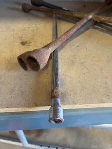 2 wheel wrenches  and long extension