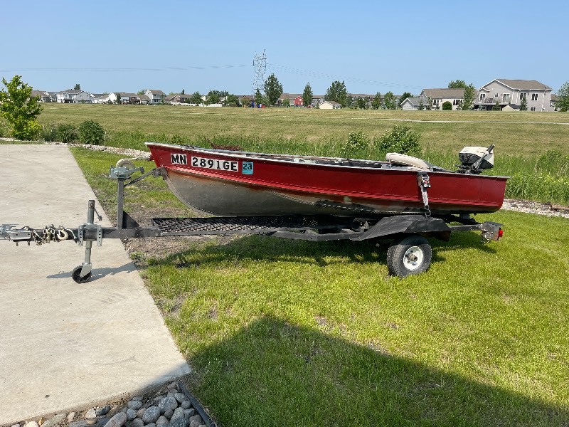 Lund Fishing Boat, Trailer, and 6HP Johnson Motor | K-BID