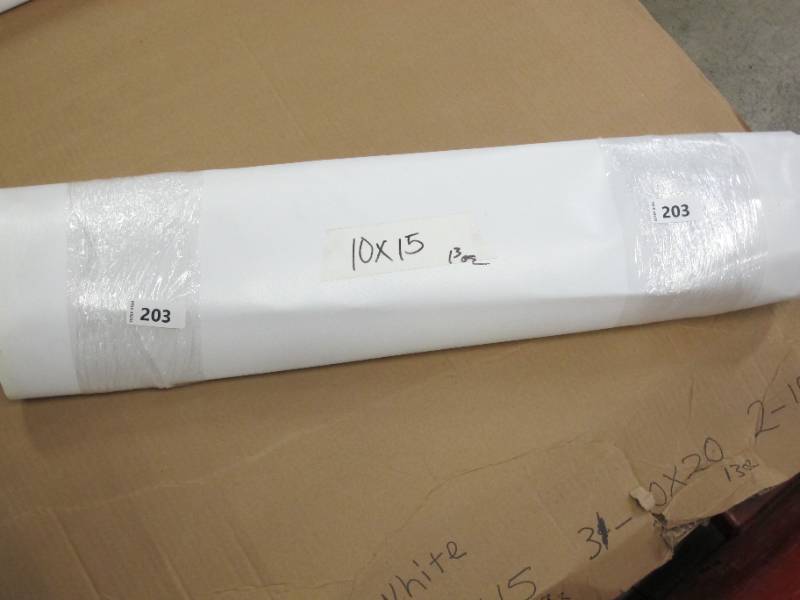 lot 529 image: NEW Vinyl Tarp - 10 x 15  White  White Vinyl tarp - 13 oz. Medium Light Duty