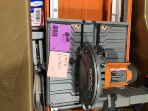 RIDGID 9 Amp Corded 7 in. Wet Tile Saw with Stand   Customer Returns See Pictures