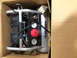Husky 1 Gal. Portable Electric-Powered Silent Air Compressor  Customer Returns See Pictures