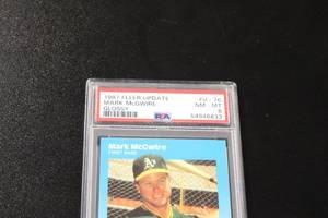 lot 182 image: 1987 Fleer Update Glossy Mark McGwire #U76 Rookie Card PSA 8
