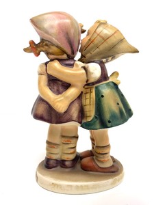 lot 24 image: Mk4 Telling Her Secret Hummel Figurine