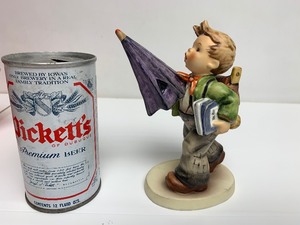 lot 38 image: Mk6 Is It Raining Hummel Figurine
