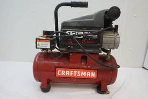 lot 112 image: air compressor