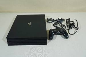 lot 31 image: PlayStation 4 Pro Console with Wireless Controller 1 TB